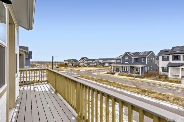 a view of a balcony with city view