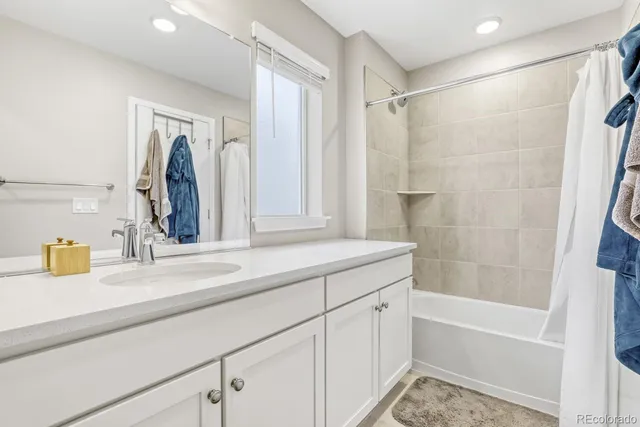a bathroom with a sink and a bathtub