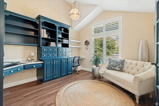 1567 Ridgeview Circle Farmington, UT 84025 - Photo 21 of 55 Wood-finish flooring, built-in cabinetry with desk space, vaulted ceiling, and window with plantation shutters