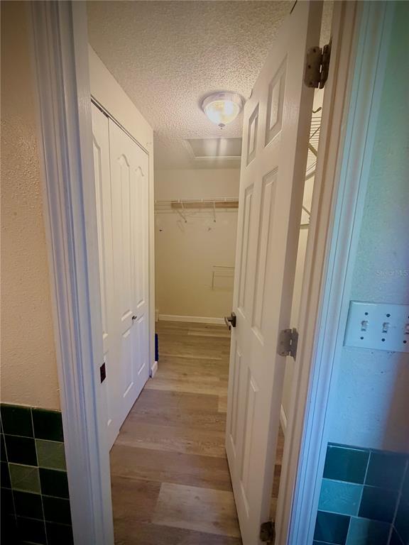 375 Pine Woods Road Ormond Beach, FL 32174 - Photo 15 of 16 a bathroom with a sink and a glass door shower