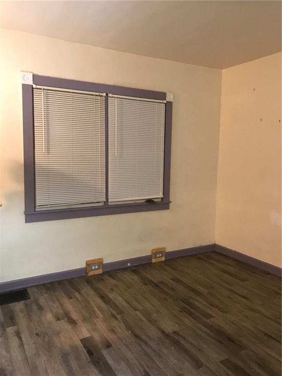 Large windows will make the living room nice and bright!