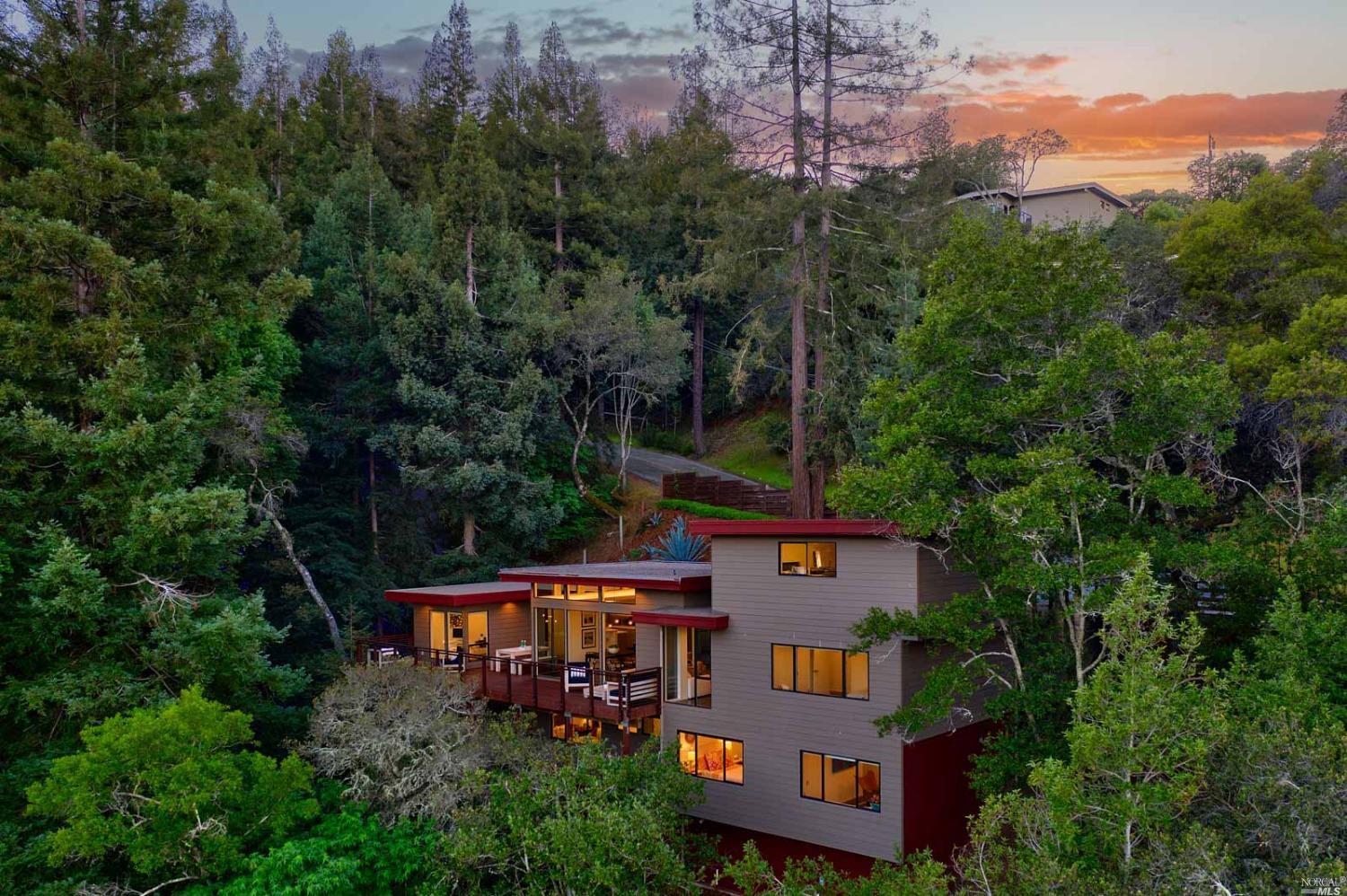 165 Upland Road Kentfield, CA 94904 - Photo 1 of 1 an aerial view of a house with pool outdoor seating yard and mountain view