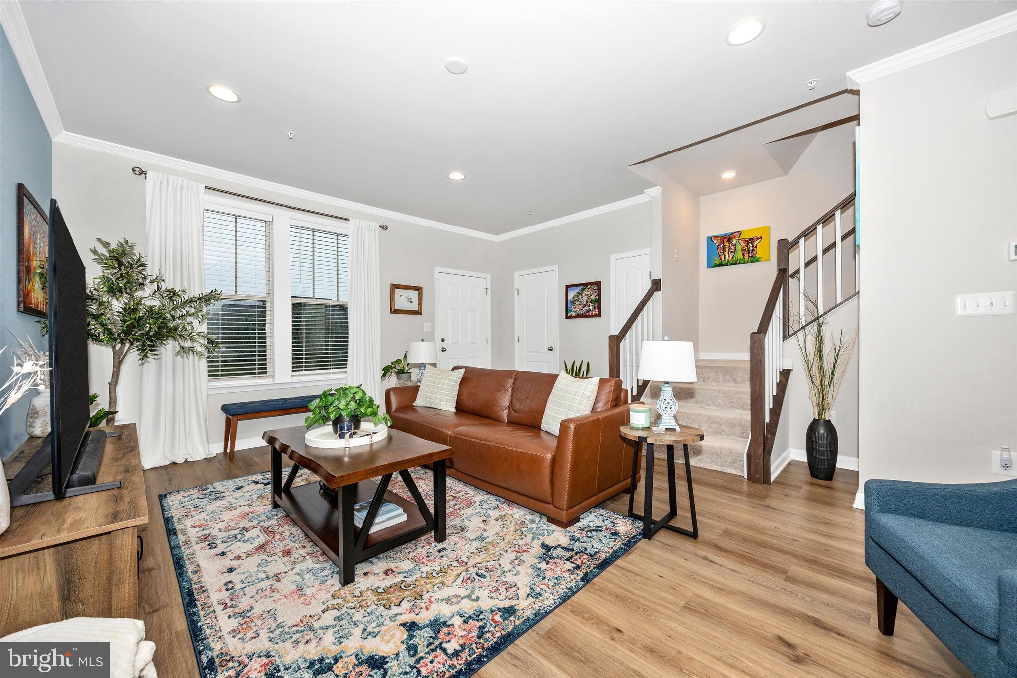 1817 Bird Run Frederick, MD 21702 - Photo 3 of 31 a living room with furniture and a potted plant