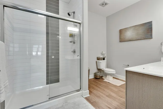 a bathroom with a tub and a shower