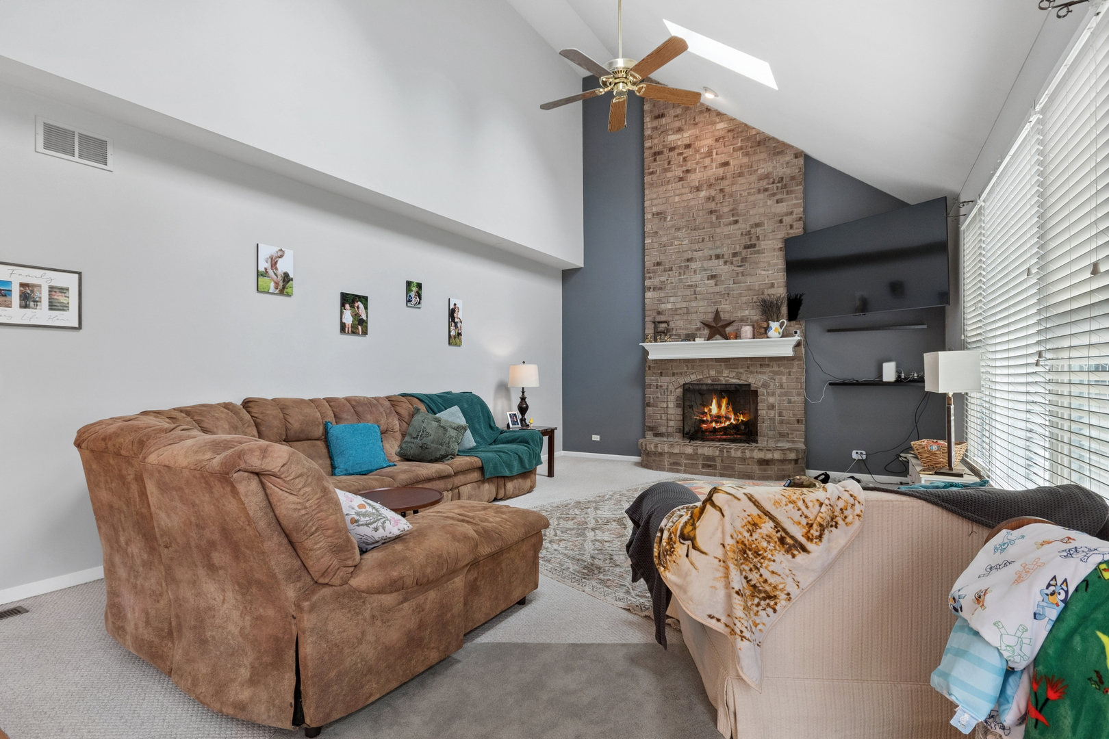 3744 Highknob Circle Naperville, IL 60564 - Photo 8 of 20 a living room with furniture and a fireplace