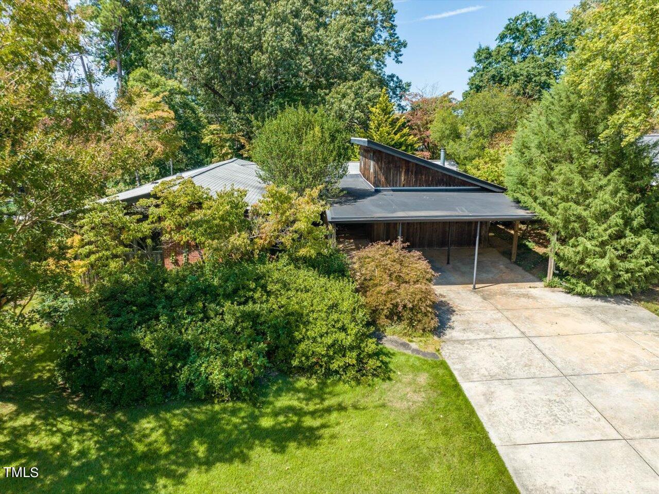 a backyard of a house with lots of green space