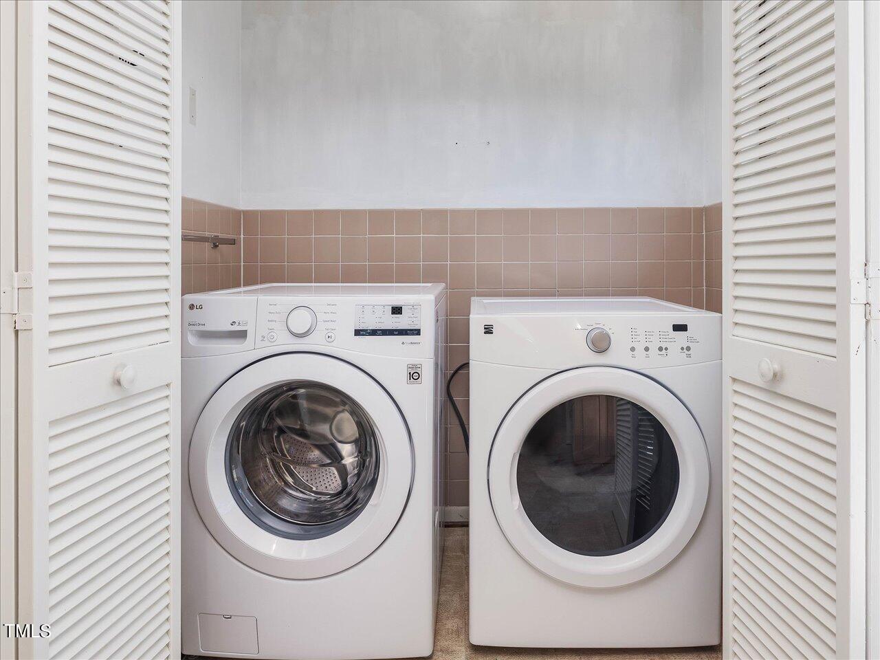 2129 Ridge Road Raleigh, NC 27607 - Photo 33 of 79 a utility room with dryer and washer