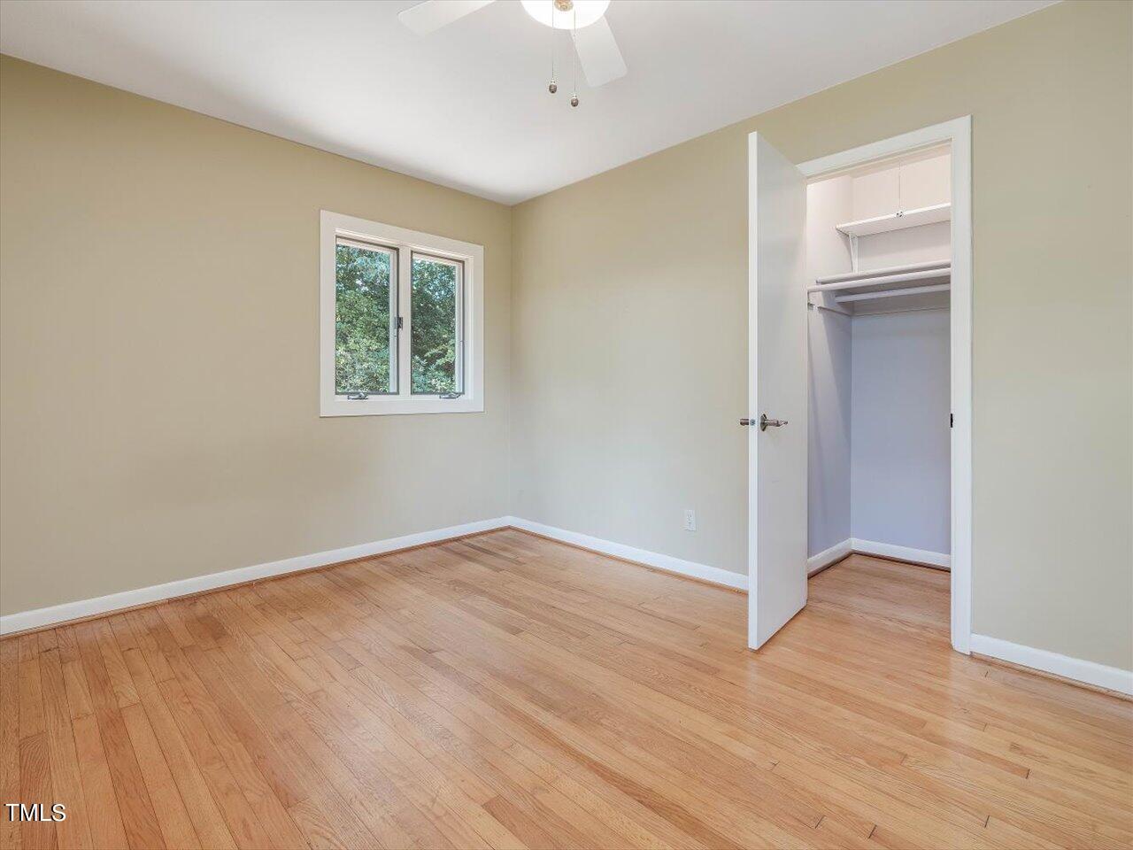 2129 Ridge Road Raleigh, NC 27607 - Photo 60 of 79 a view of an empty room with closet and a window