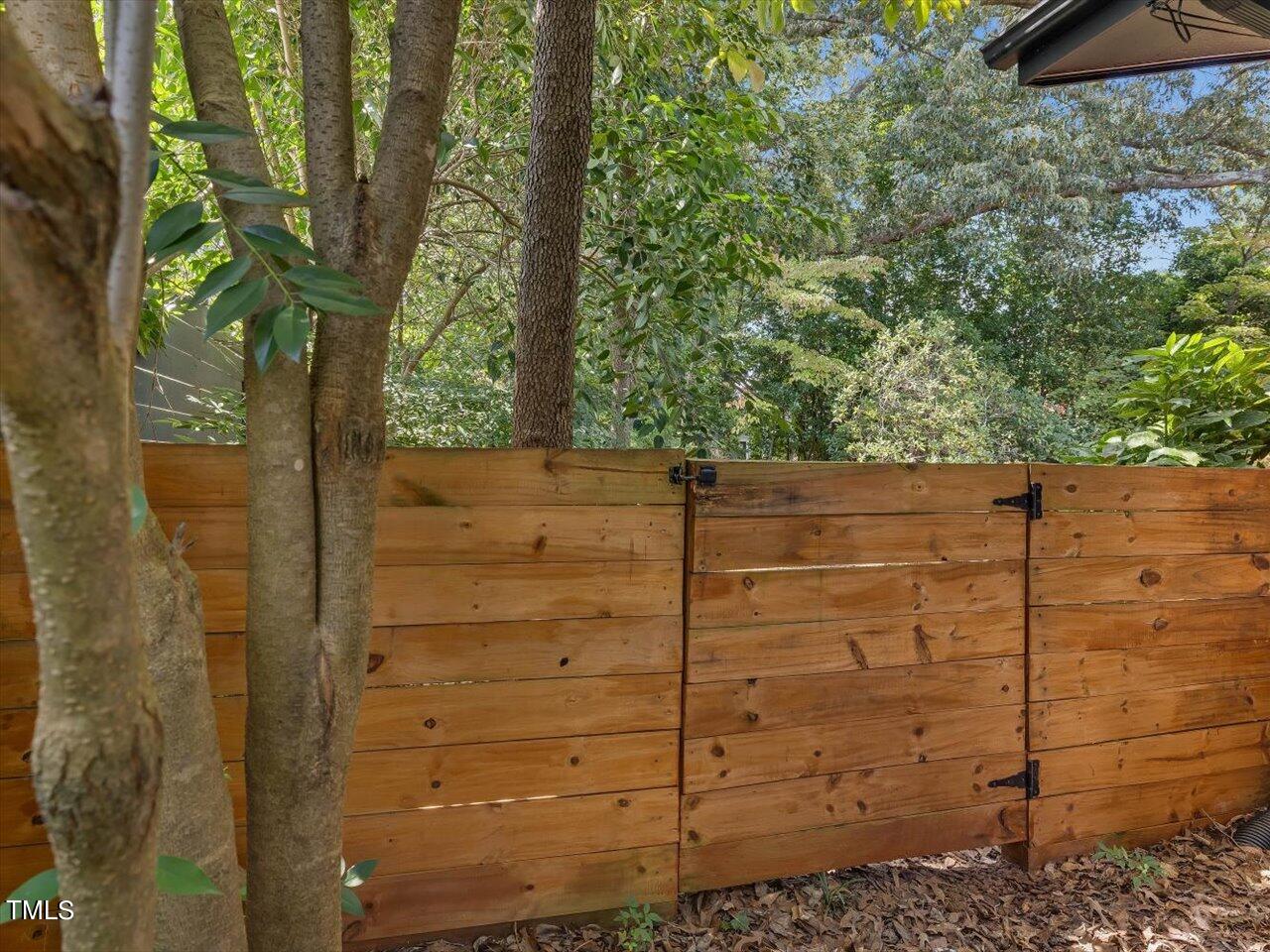2129 Ridge Road Raleigh, NC 27607 - Photo 64 of 79 a view of a wooden fence