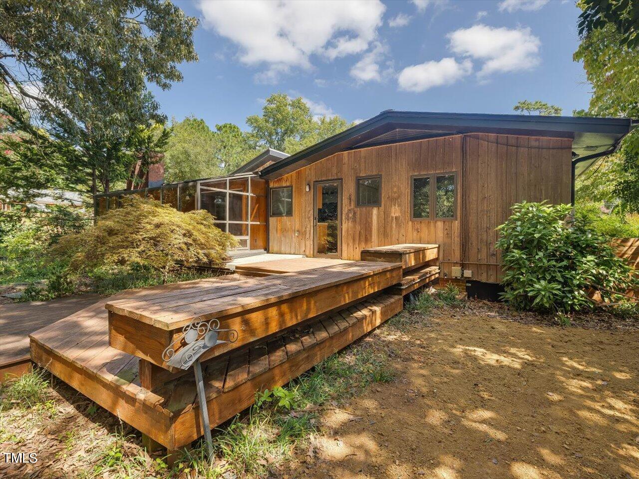2129 Ridge Road Raleigh, NC 27607 - Photo 71 of 79 a view of a house with backyard and sitting area