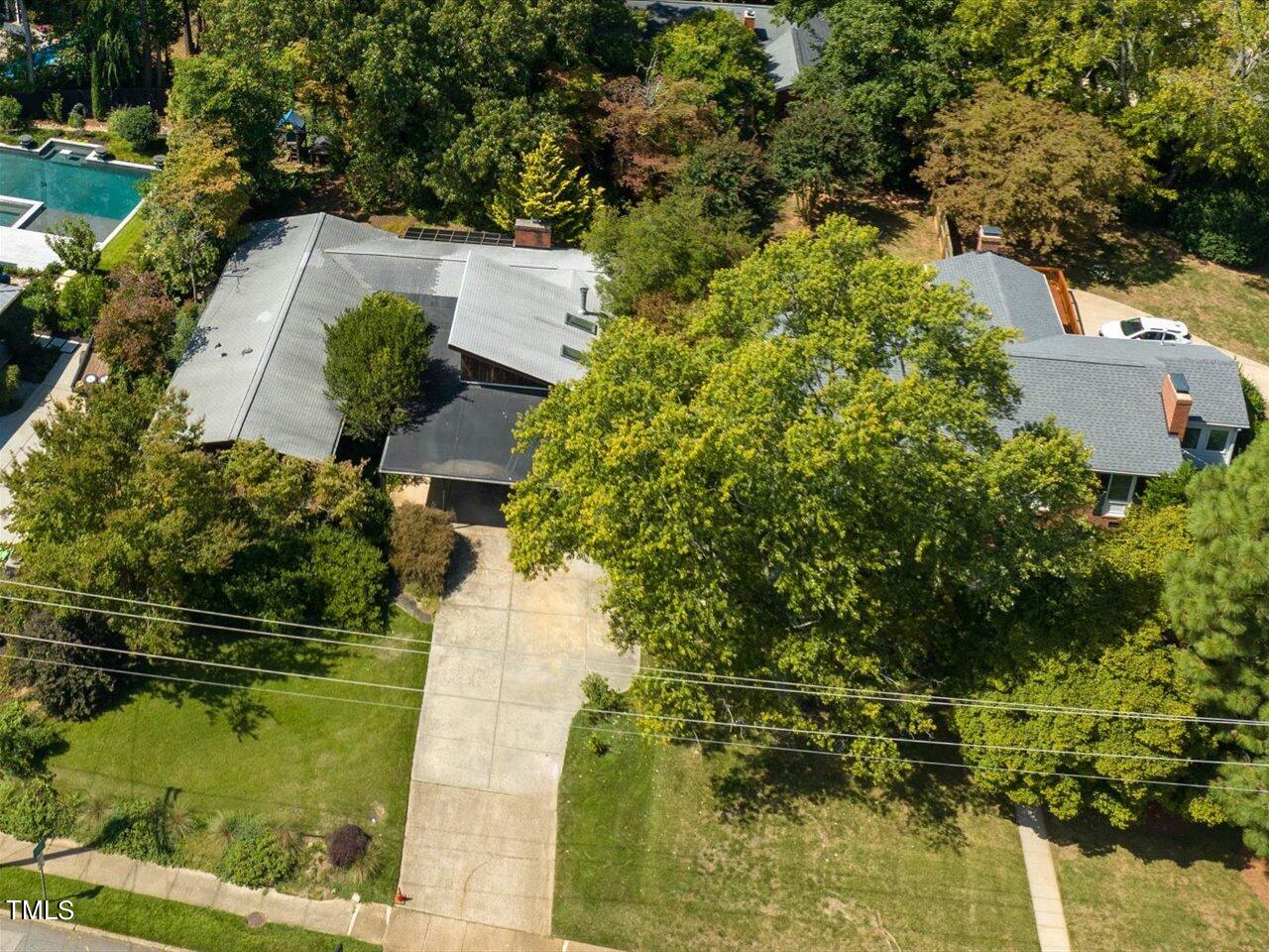 2129 Ridge Road Raleigh, NC 27607 - Photo 75 of 79 an aerial view of a house with a yard
