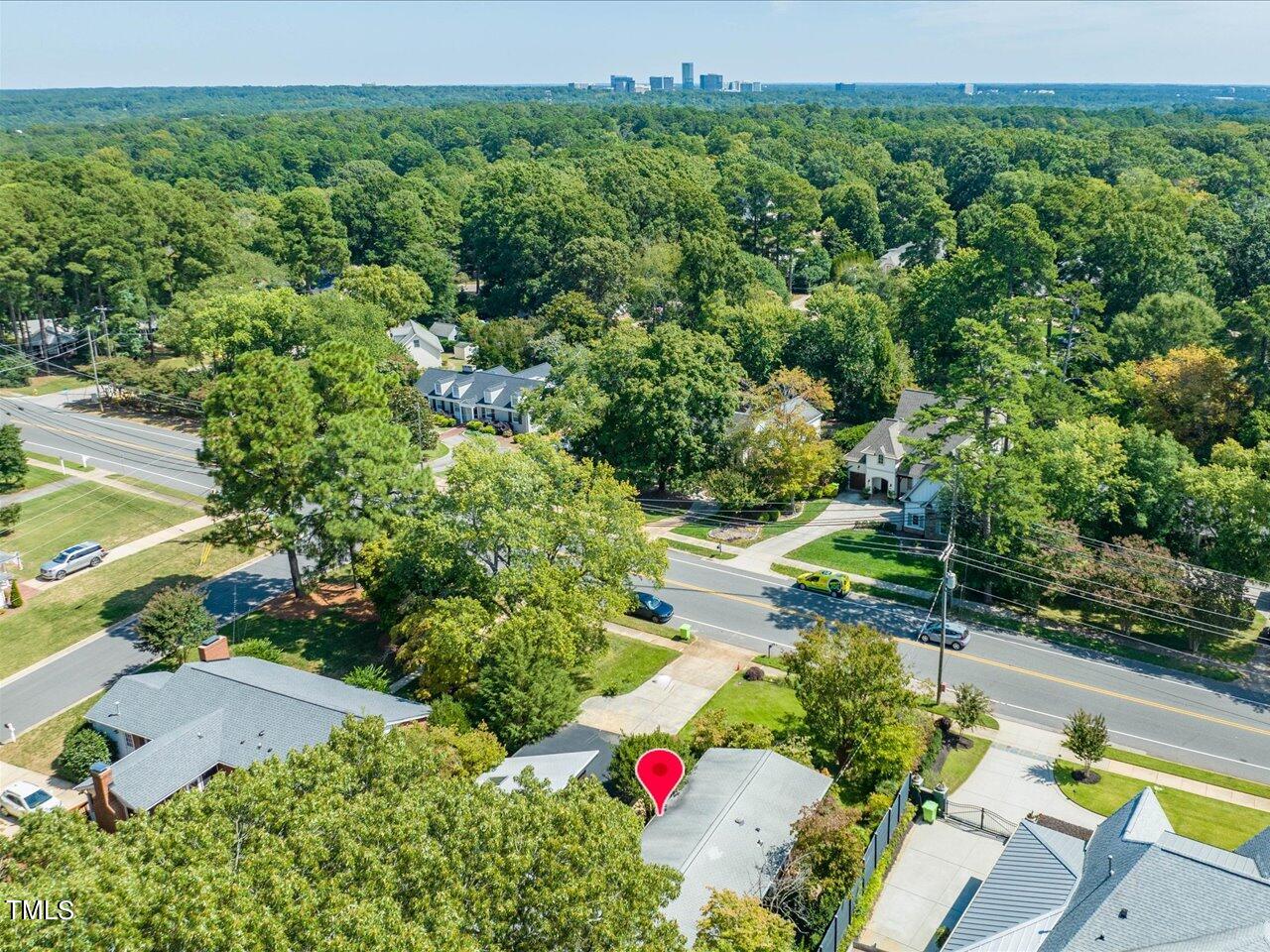 2129 Ridge Road Raleigh, NC 27607 - Photo 78 of 79 an aerial view of a house with a yard