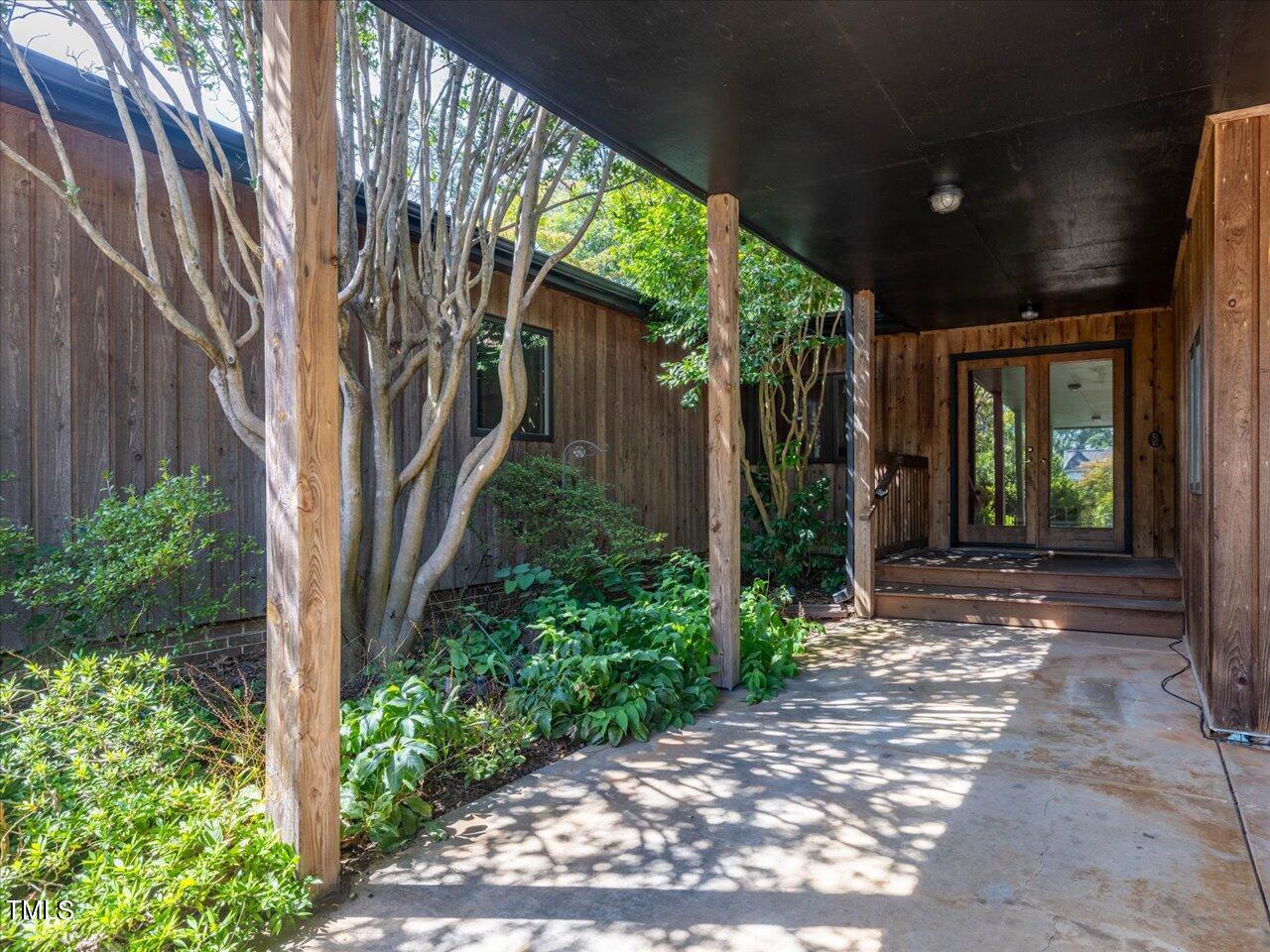 2129 Ridge Road Raleigh, NC 27607 - Photo 8 of 79 a view of a house with a garden