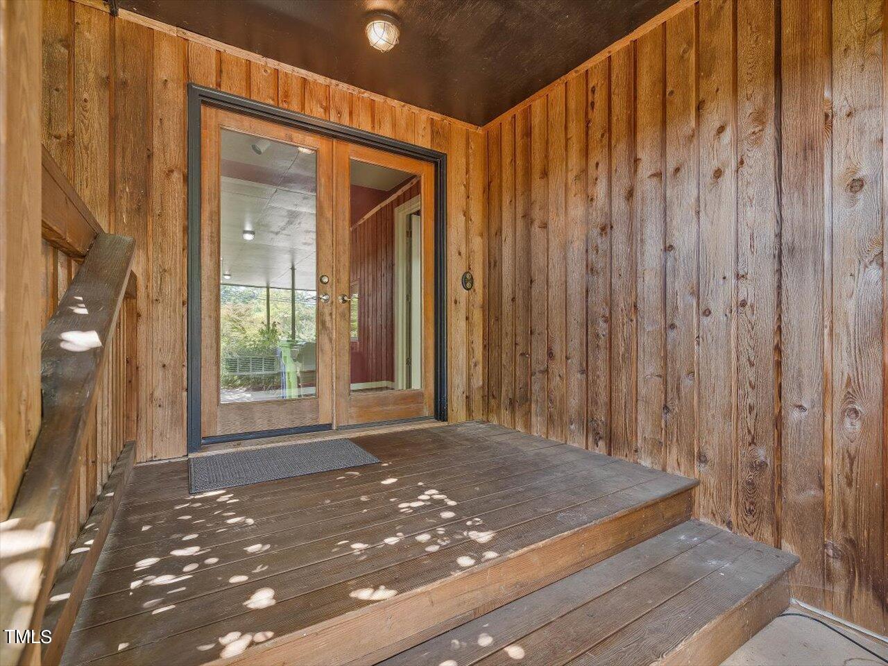 2129 Ridge Road Raleigh, NC 27607 - Photo 9 of 79 a view of a room with a door and a window