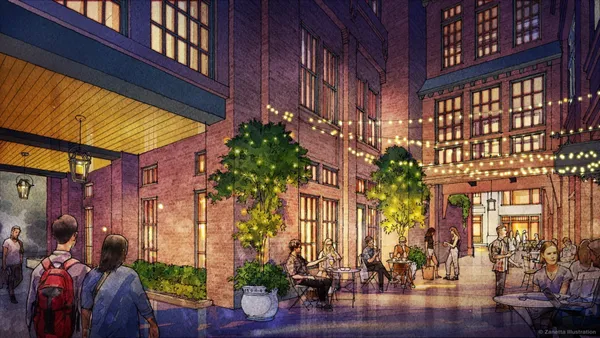 a view of a building with a lot of flowers potted plants