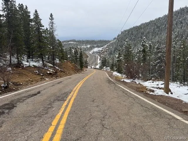 a view of a road with a building