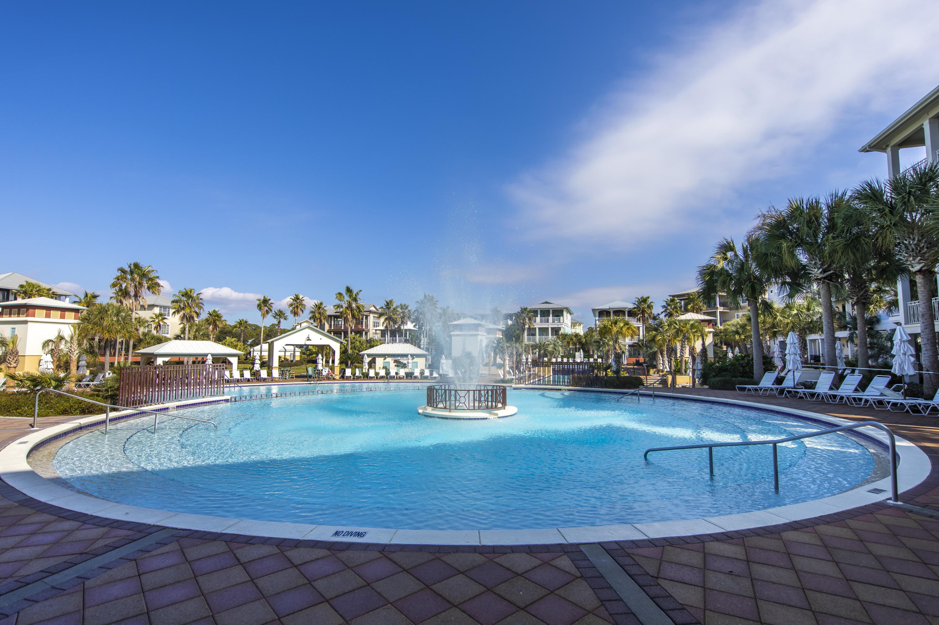 Lot 14 Block Q Blue Dolphin Ct Inlet Beach Inlet Beach, FL 32461 - Photo 13 of 14 a view of a swimming pool with lawn chairs