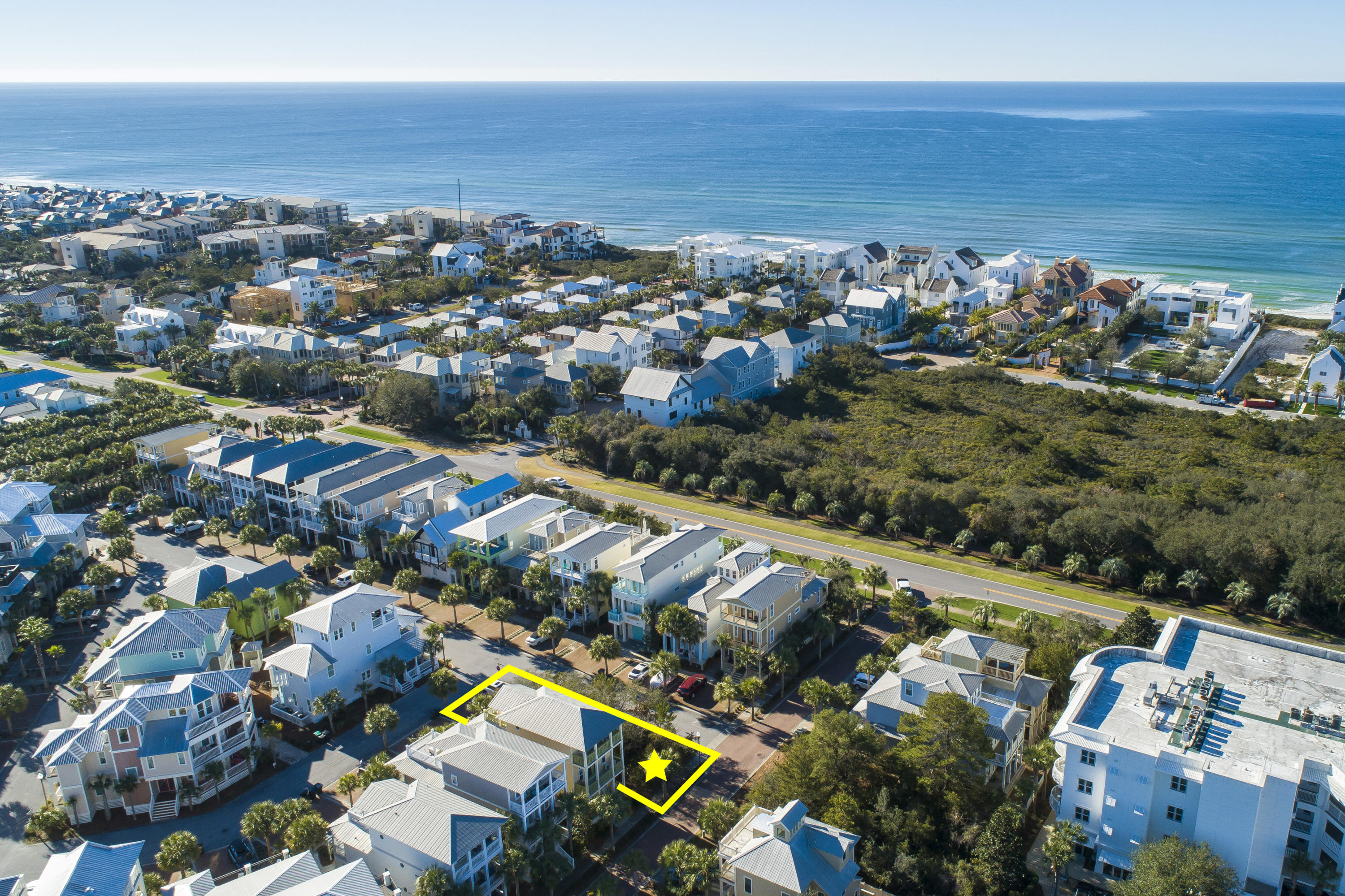 Lot 14 Block Q Blue Dolphin Ct Inlet Beach Inlet Beach, FL 32461 - Photo 2 of 14 an aerial view of a city with lots of residential buildings ocean and mountain view in back