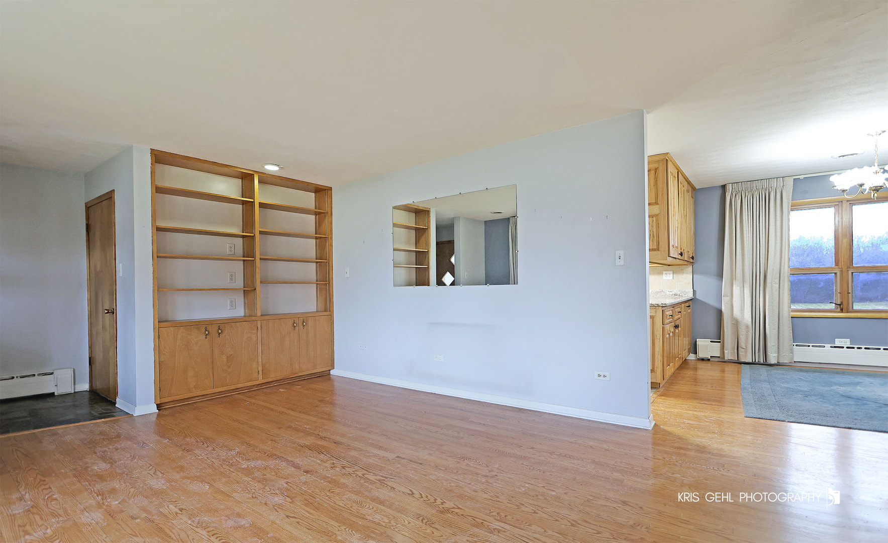 40798 North Forest View Road Wadsworth, IL 60083 - Photo 4 of 29 a view of an empty room with wooden floor and a window