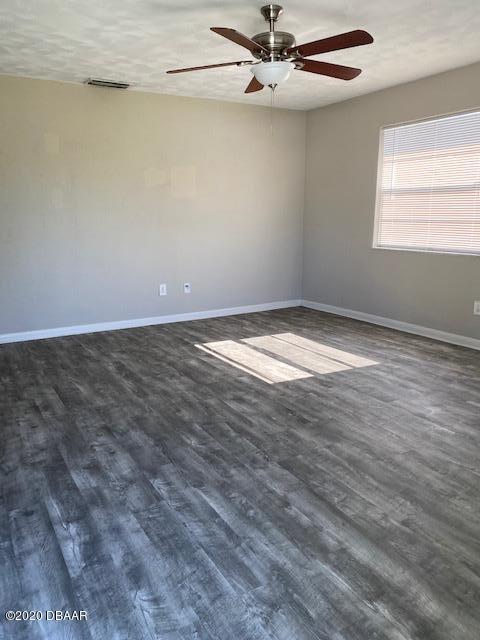 121 Milton Road Daytona Beach, FL 32118 - Photo 6 of 19 living room 2
