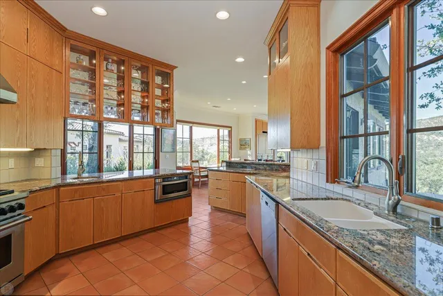 a living room with furniture or couch and a large window