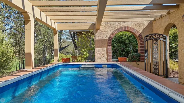 a view of front door and porch with wooden floor