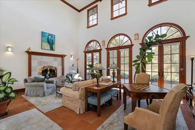 a view of a brick house with a large window
