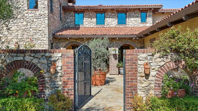 a front view of a house with glass windows