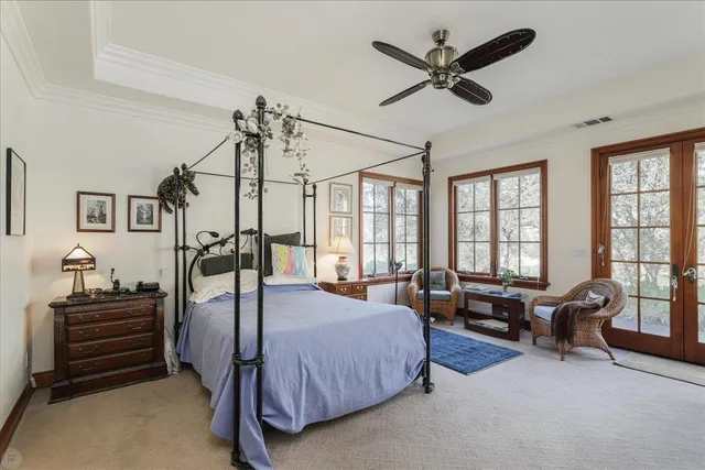 an aerial view of residential houses with outdoor space and river