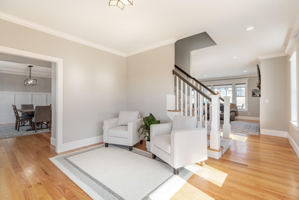 10 Rochambeau Avenue Wrentham, MA 02093 - Photo 24 of 40 a living room with furniture and wooden floor