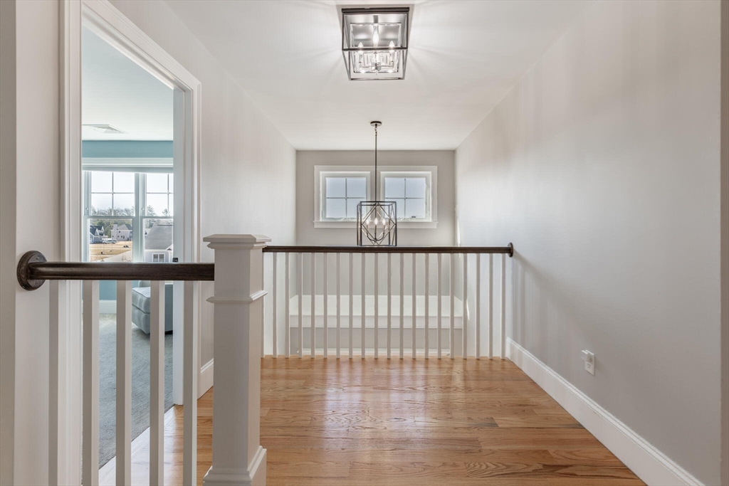 10 Rochambeau Avenue Wrentham, MA 02093 - Photo 25 of 40 a view of an entryway with wooden floor