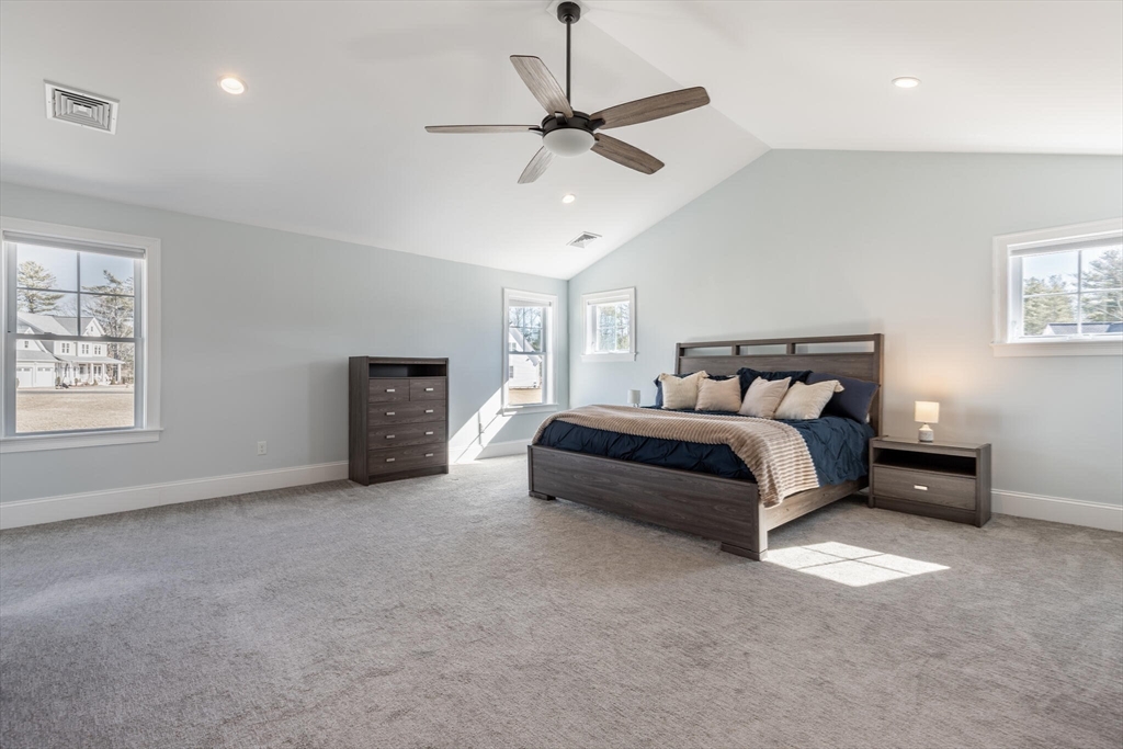 10 Rochambeau Avenue Wrentham, MA 02093 - Photo 26 of 40 a bedroom with a bed and a ceiling fan