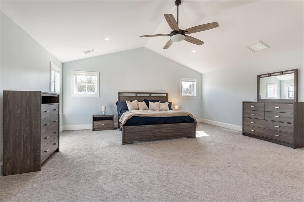 10 Rochambeau Avenue Wrentham, MA 02093 - Photo 27 of 40 a bedroom with a bed and cabinets