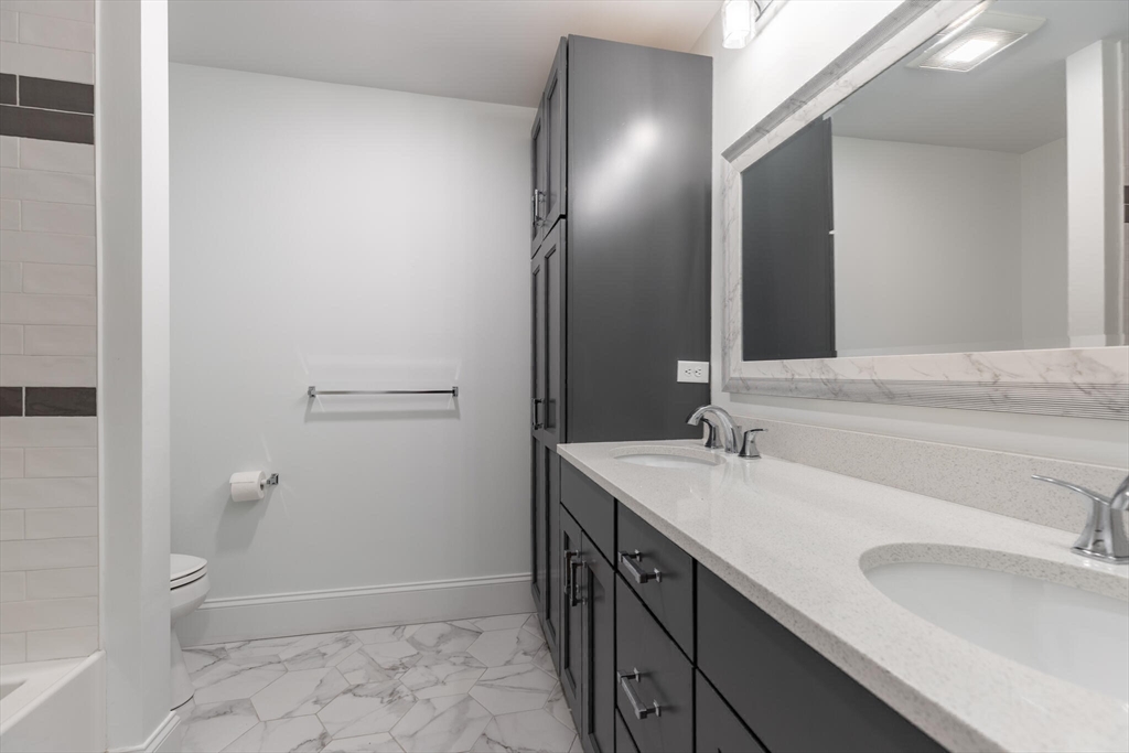 10 Rochambeau Avenue Wrentham, MA 02093 - Photo 30 of 40 a bathroom with a sink and a mirror