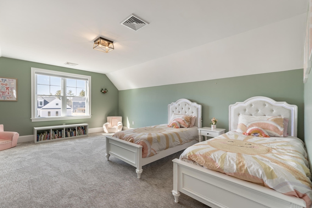 10 Rochambeau Avenue Wrentham, MA 02093 - Photo 31 of 40 a bedroom with two beds and painting on the wall