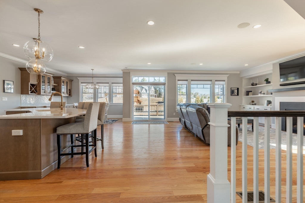 10 Rochambeau Avenue Wrentham, MA 02093 - Photo 9 of 40 a view of kitchen with dining table chairs and stove