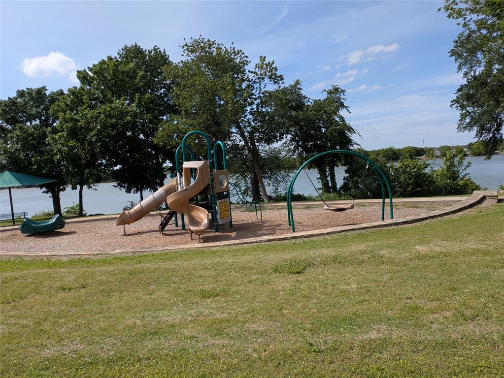 2802 Merlot Circle Rowlett, TX 75088 - Photo 3 of 40 a view of a park with slides