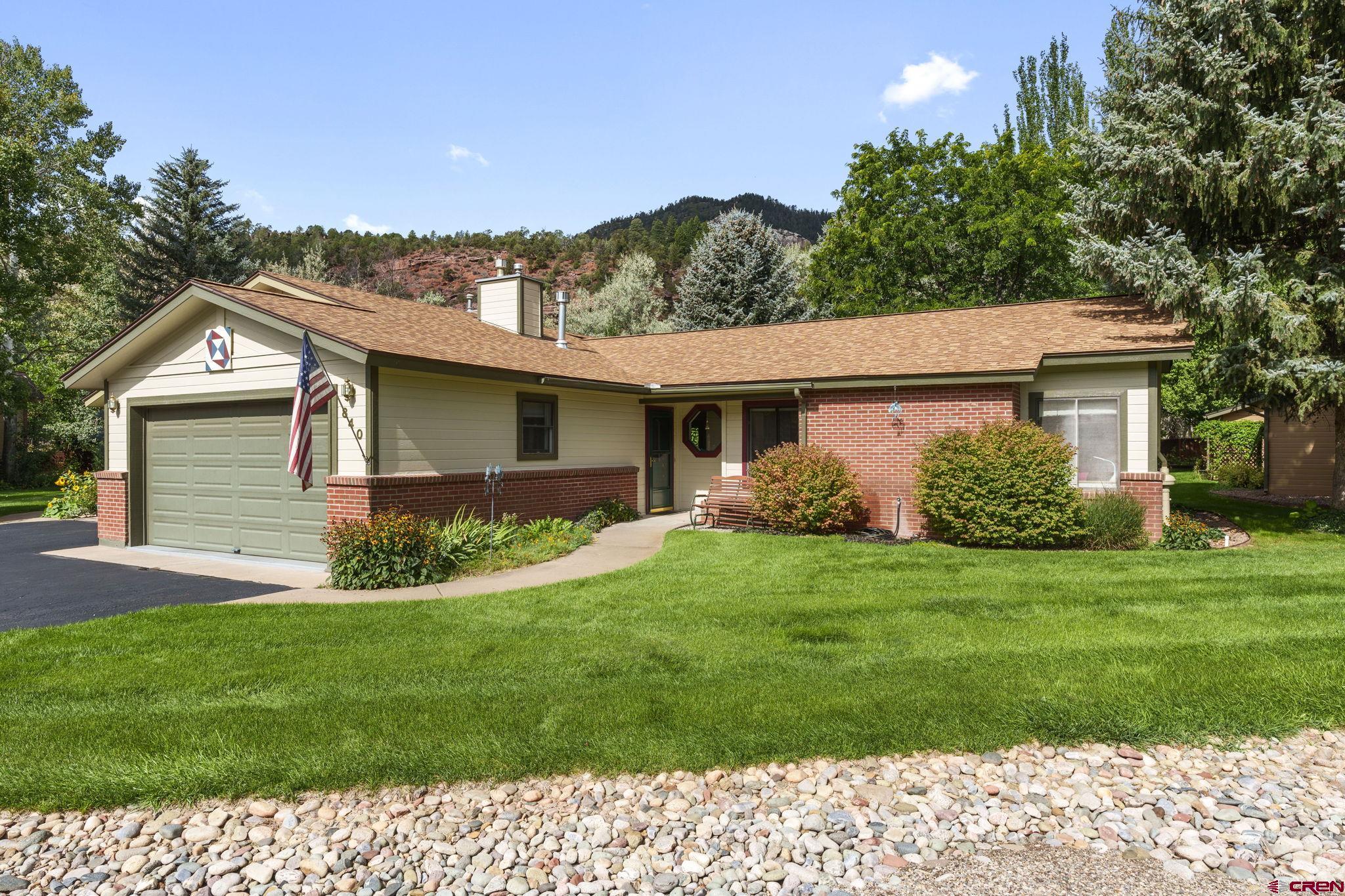 840 Waterfall Lane Durango, CO 81301 - Photo 1 of 31 a view of a house with a yard