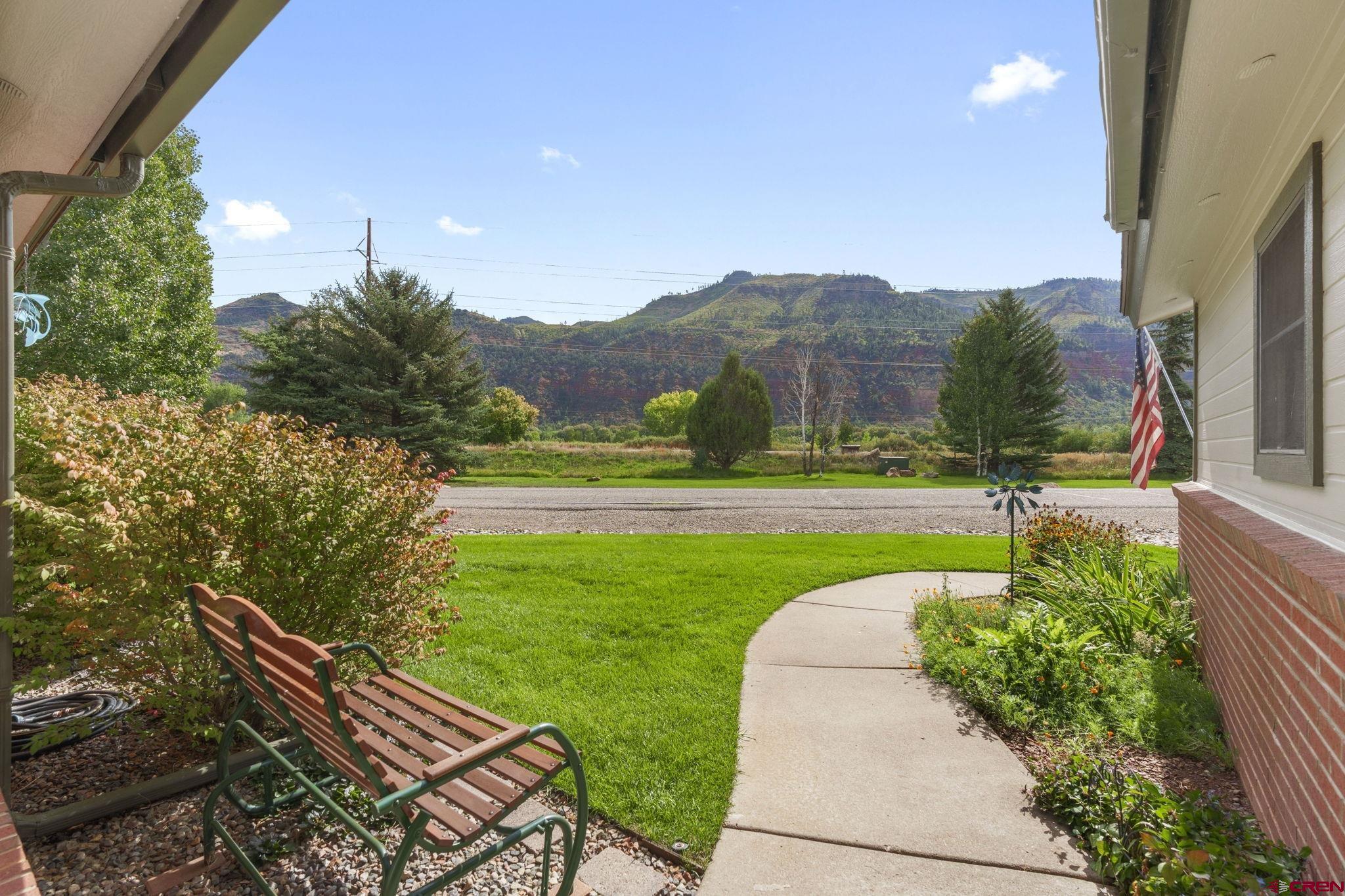 840 Waterfall Lane Durango, CO 81301 - Photo 3 of 31 a view of a garden with an outdoor seating