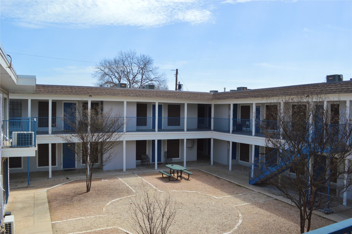 4709 Harmon Avenue, Unit 421 Austin, TX 78751 - Photo 2 of 11 a front view of a house with a porch