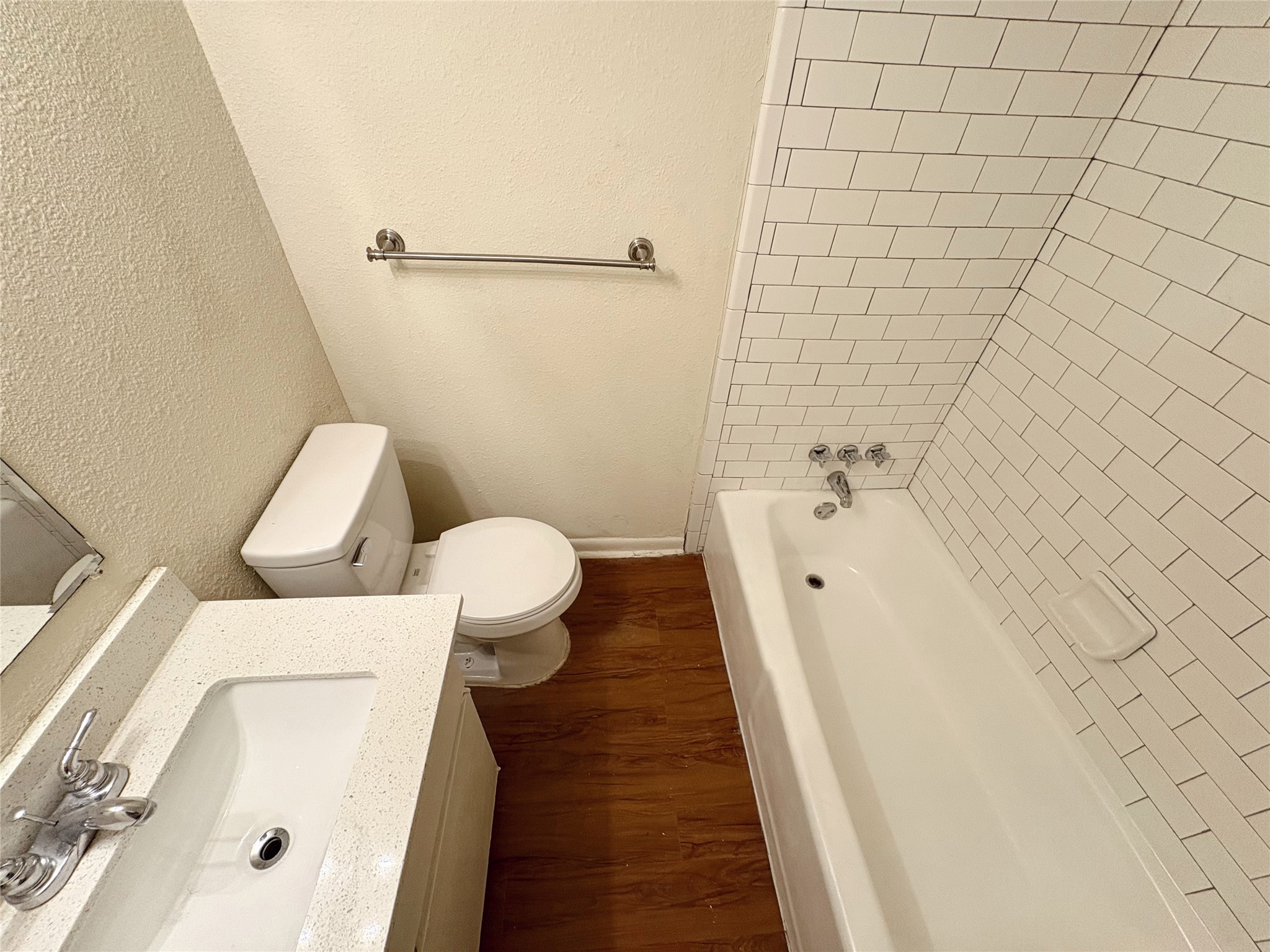 4709 Harmon Avenue, Unit 421 Austin, TX 78751 - Photo 9 of 11 a bathroom with a toilet and a tub