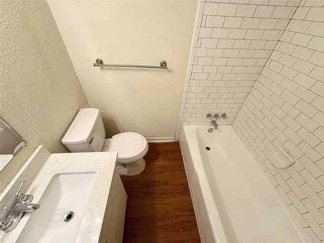 a bathroom with a sink and a toilet
