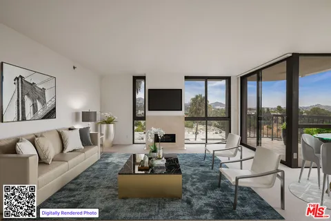 a living room with furniture large windows and a flat screen tv