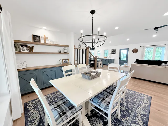 a kitchen with kitchen island granite countertop lots of counter top space and stainless steel appliances