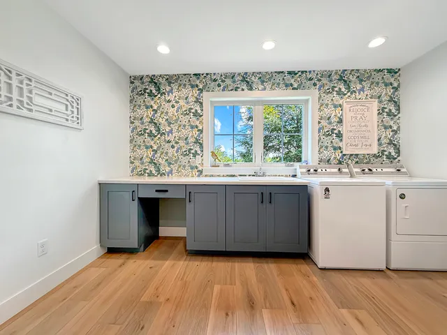 a bedroom with a bed and a mirror