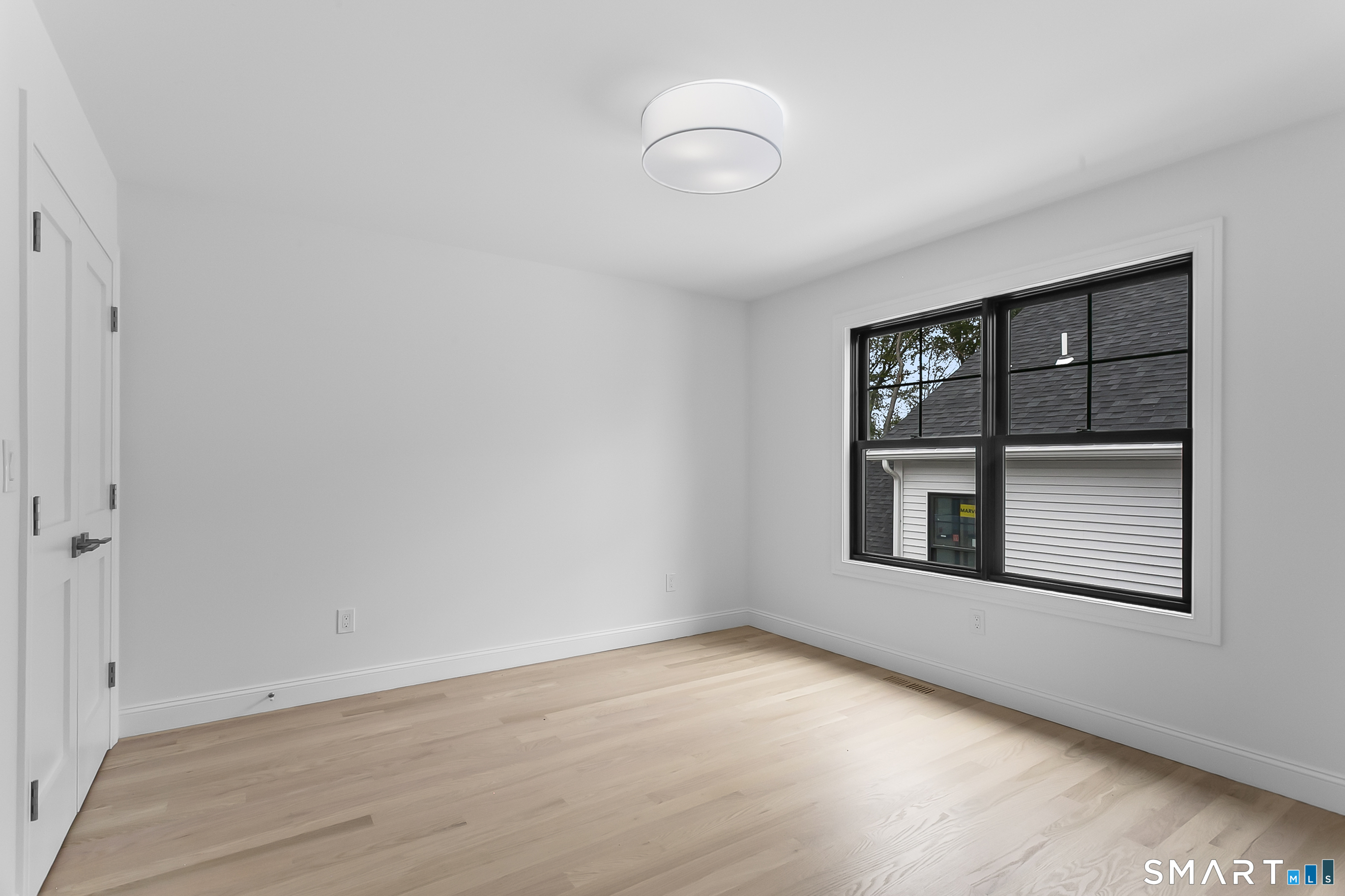 95 Oronoque Lane Stratford, CT 06614 - Photo 25 of 30 a view of an empty room with a window