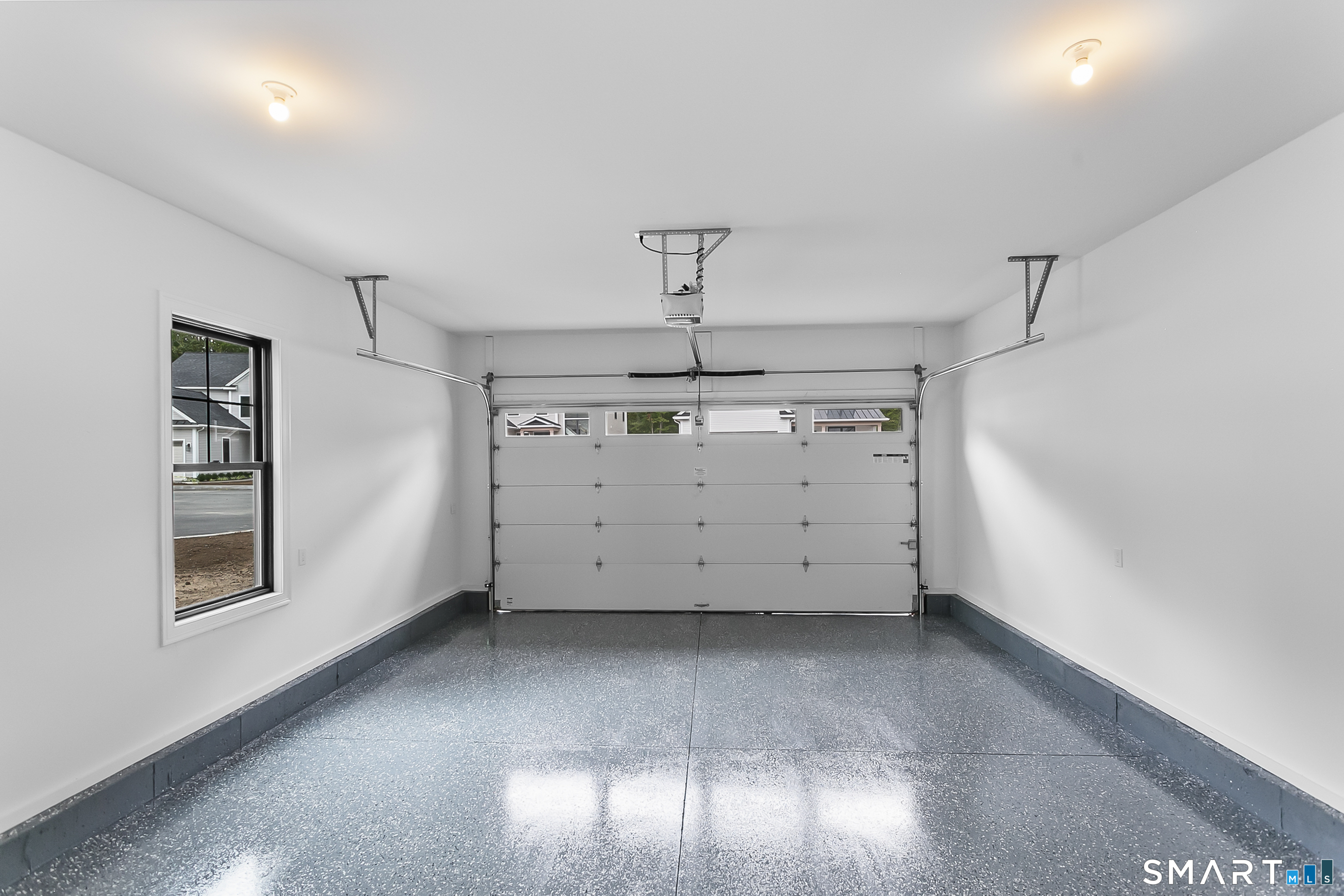 95 Oronoque Lane Stratford, CT 06614 - Photo 28 of 30 a view of a garage room