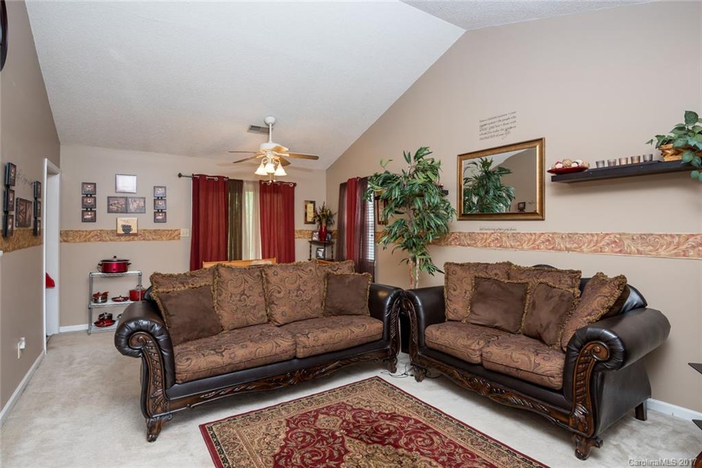 3821 Rosedown Drive Matthews, NC 28105 - Photo 5 of 19 a living room with furniture and a couch
