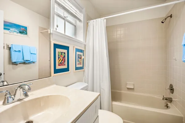 a bathroom with a sink and a bathtub