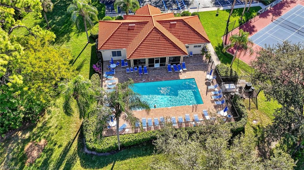 209 Robin Hood Circle, Unit 201 Naples, FL 34104 - Photo 21 of 29 an aerial view of a house